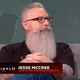 Former Blizzard developer Jesse McCree sitting during a BlizzCon 2019 panel.